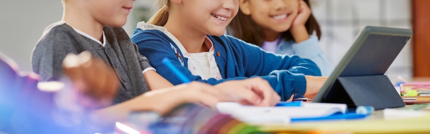 Digital learning scene in an elementary classroom.